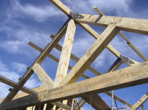 Mortise and Tenon trusses with steel brackets that I made for our adobe home